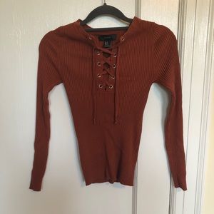 Burnt orange lace up ribbed top